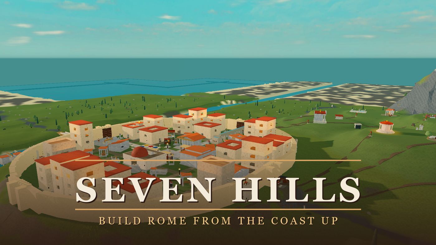 An aerial view of a walled Roman town of white and terracotta buildings on green farmland beside the sea.